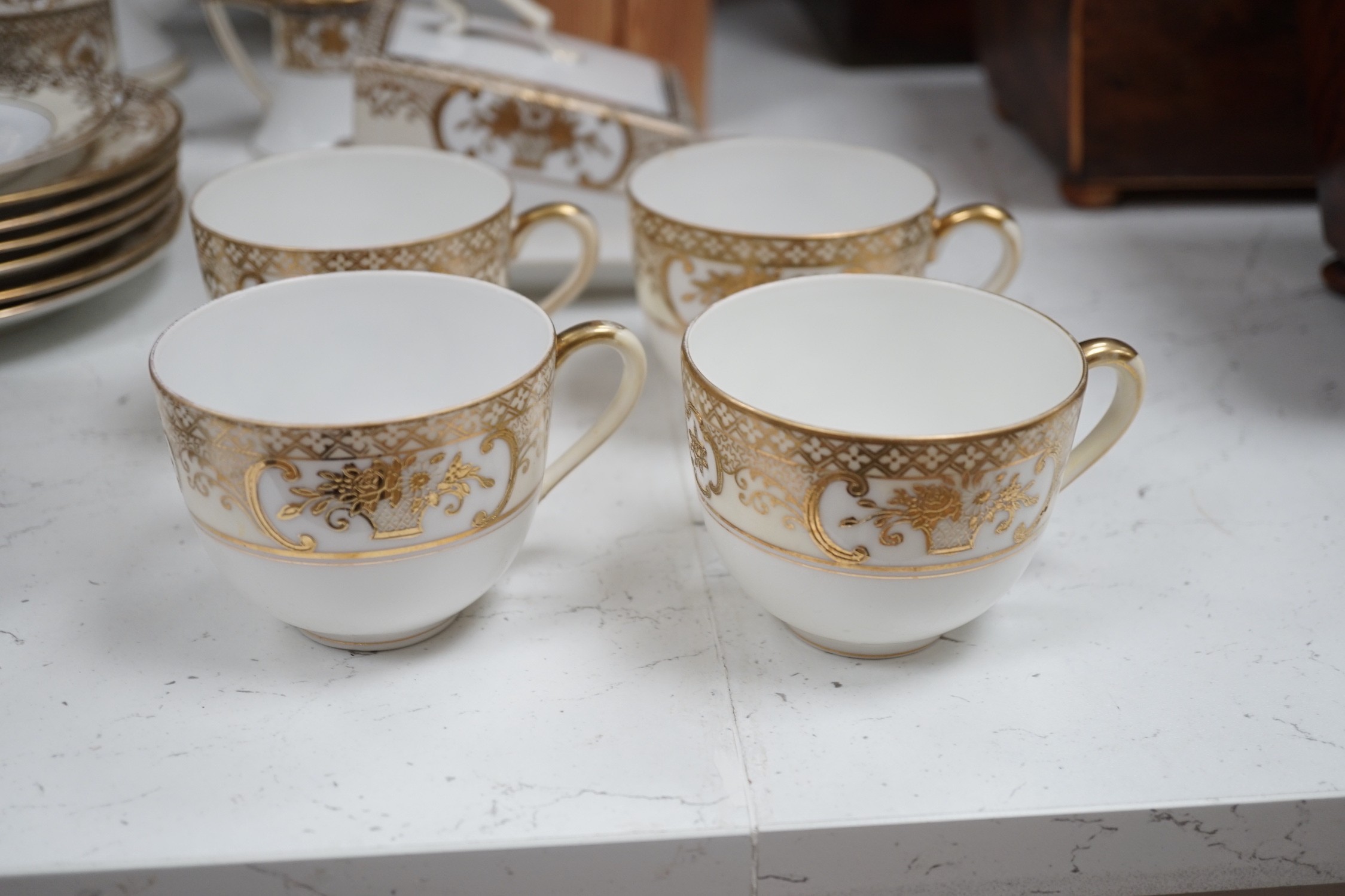 A Noritake tea and coffee set, pattern number 44318